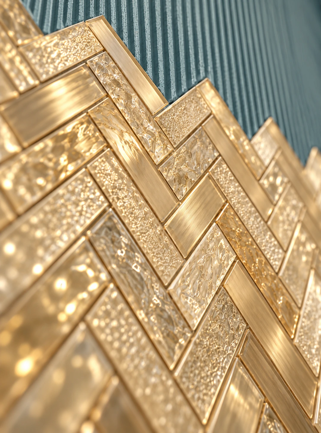 Illustration of golden glass herringbone tile installation with blue-green adhesive, viewed from a low angle